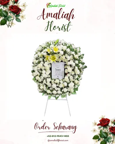 Krans Bunga Duka Cita di Negeri Olok Gading